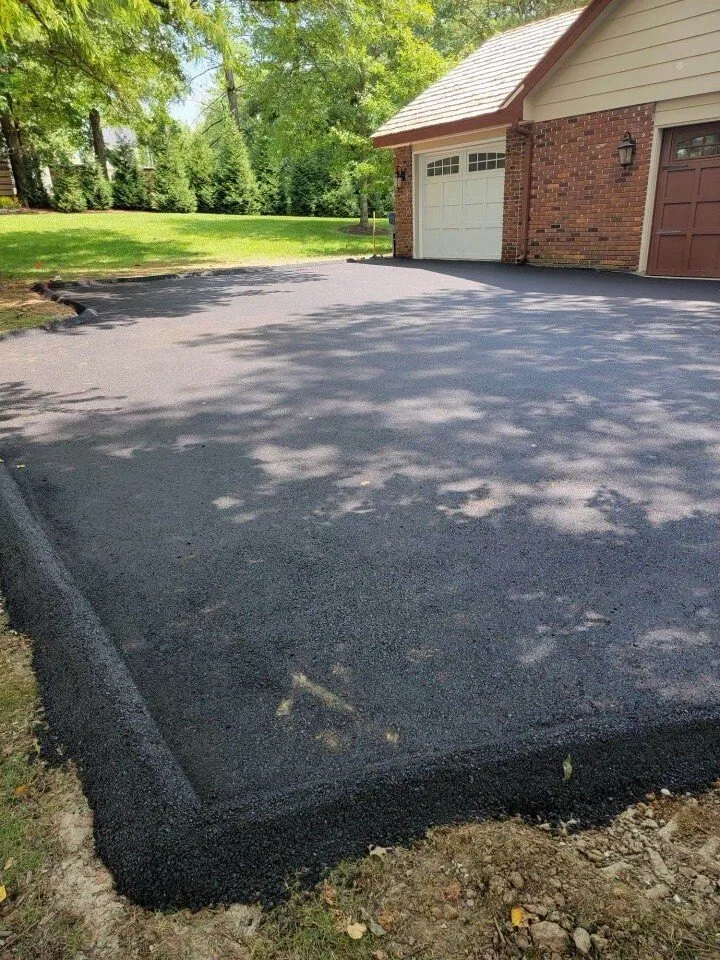 K&K Contracting freshly laid asphalt - residential driveway - St. Louis, MO