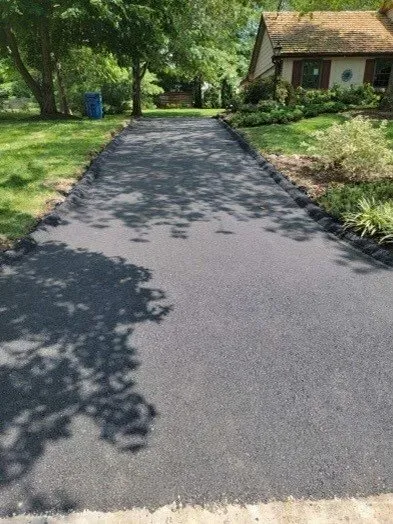 K&K Contracting - freshly laid asphalt driveway - St. Louis, MO
